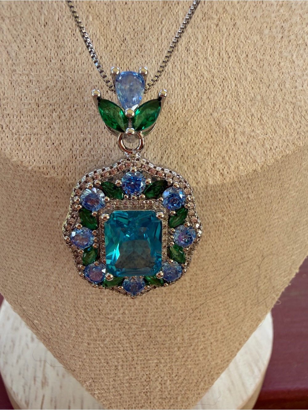 Blue Emerald Cut Mossanite  with green & blue side stones.5 ct, 11*8 mm NWOT